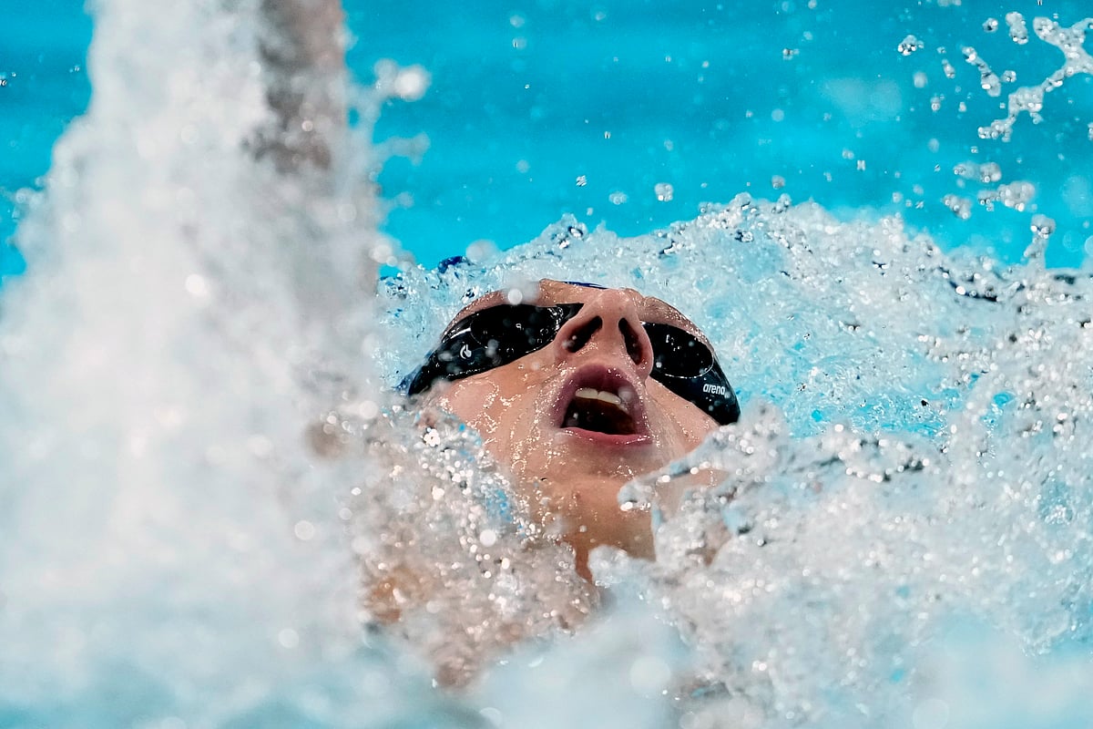  (AP Photo/Matthias Schrader) : Lukas Maertens, of Germany, competes in the men's 200-meter backstroke semifinal at the 2024 Summer Olympics, Wednesday, July 31, 2024, in Nanterre, France.